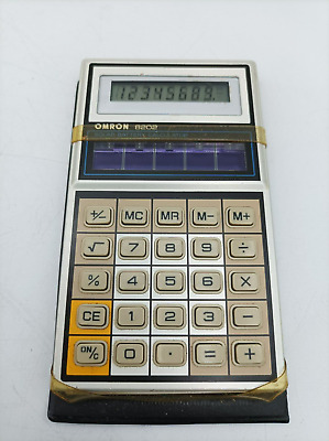 OMRON: 8202 vintage solar calculator with manual.