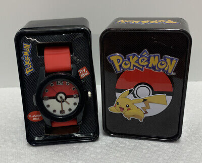 ACCUTIME POKEMON POKEBALL RED AND WHITE WRIST WATCH Collectors Tin Flashing Dial
