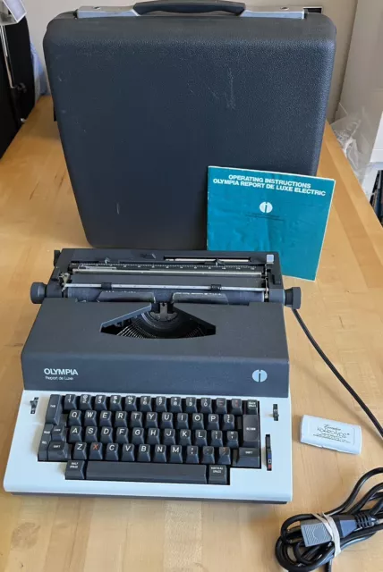 Olympia Report de Luxe Electric Typewriter  Germany w/Case/ Manual TESTED *1975