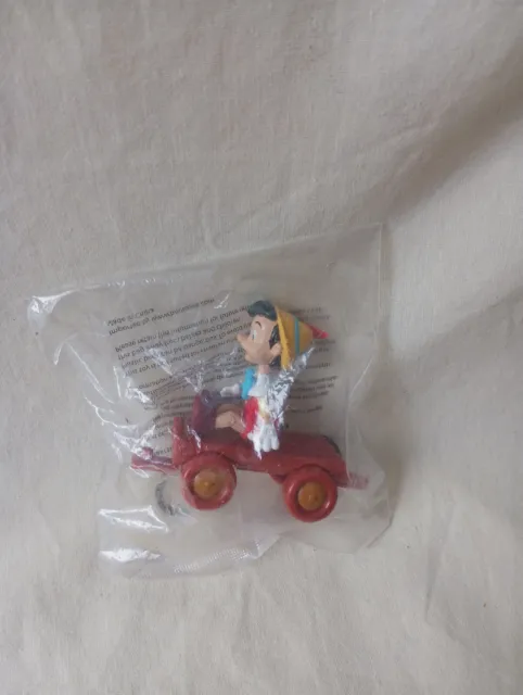 Figurine Pinocchio Sur Chariot Wagonnet Disney Neuf