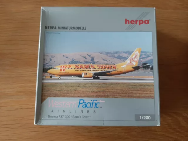 Herpa Wings 550284 Western Pacific Boeing 737-300 "Sam's Town" Scale 1/200