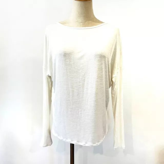 Whisper Activewear Movement White Long Sleeved Top Cut Out Back