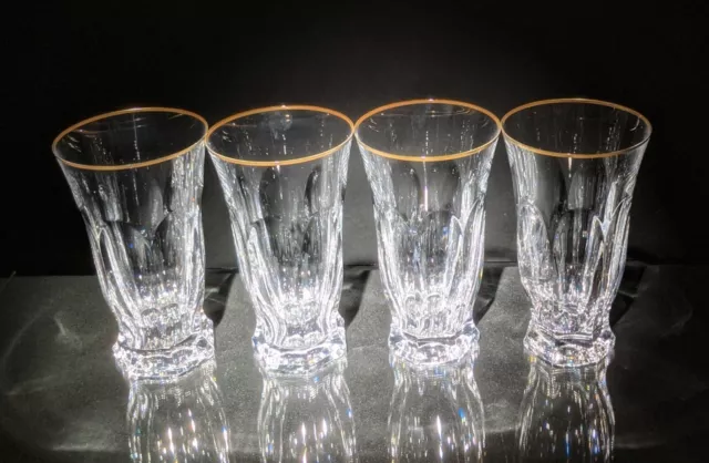 https://www.picclickimg.com/6PsAAOSwKGRkT-nm/Faberge-Aurora-Highball-Glasses-Set-of-4-NIB.webp