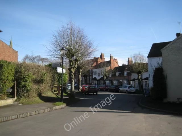 Photo 6x4 View of The Green in shadow Tanworth-in-Arden Seen from the cor c2011