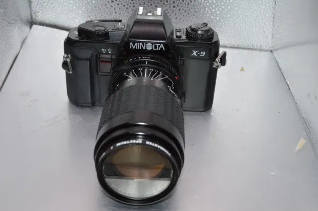 Minolta X-9 35mm SLR with sigma 70-210mm Zoom IV  Lens and sky filter | used