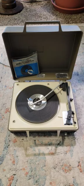 Vintage General Electric Solid State Automatic Portable Record Player.