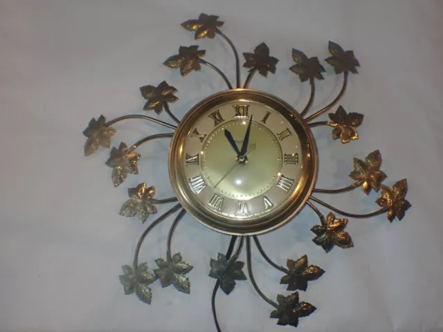 Vintage UNITED Electric Wall CLOCK Maple Leaves Metal WORKS Model 77 USA 1967