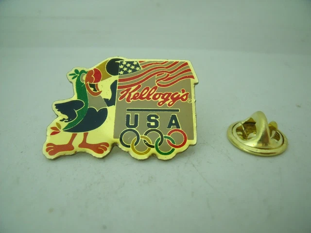 Pin's Mascotte Olympique. Chiffre 9. Vert 1992. Cojo 1991
