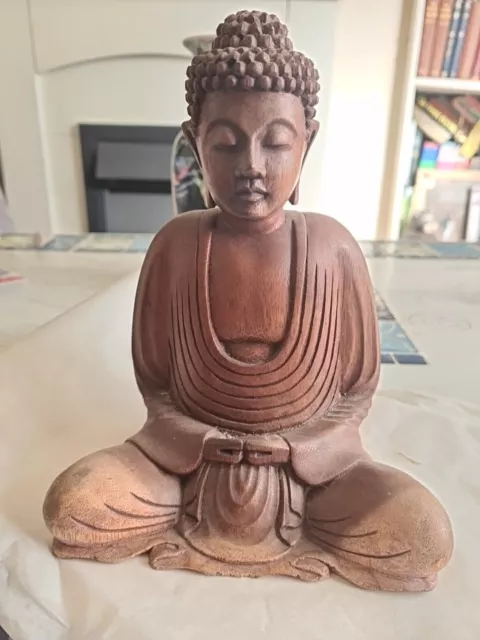 hand carved wooden buddha statue