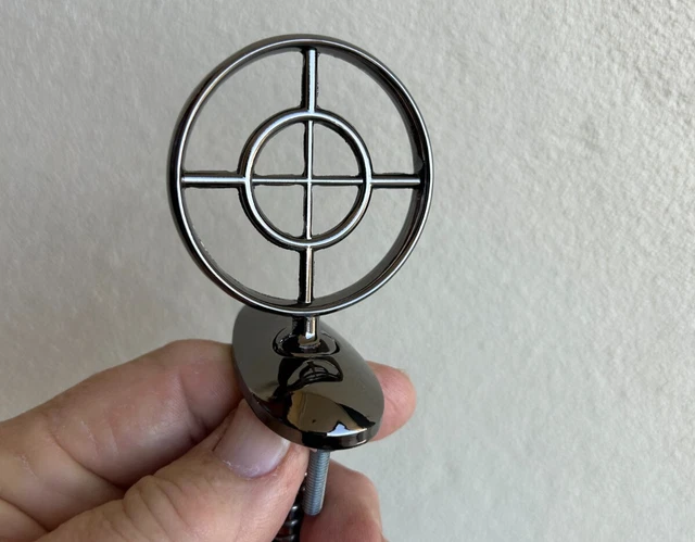 thumbnail image 2 of World Car Emblems Flat Black Metal Gunsight Hood Ornament – Anti-Aircraft Gun Style 2 of 3