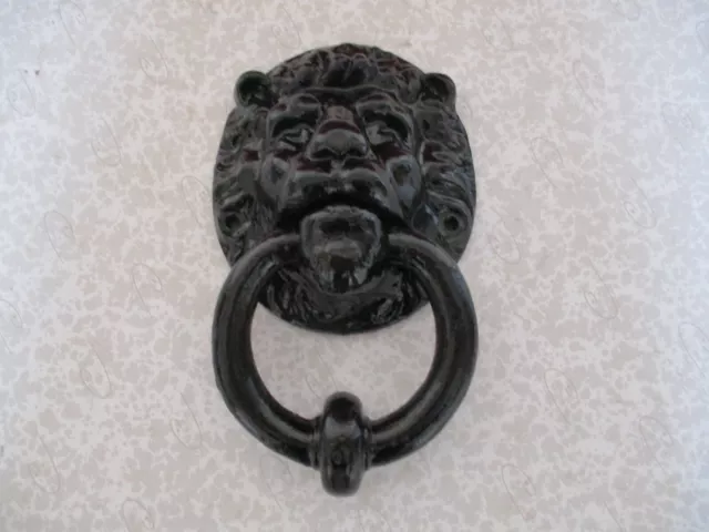 HEURTOIR de PORTE EN ACIER. TÊTE de LION.