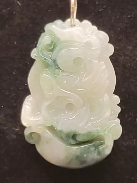 Beautiful pre-owned Carved Jade Pendant on 20" 925 sterling silver chain.