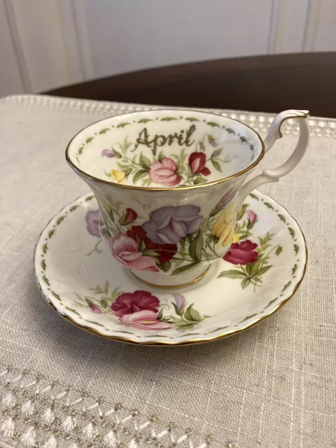 Royal Albert China April Flower of the Month 'Sweet Pea" Footed Teacup Set Exc Royal Albert China April Flower of the Month 'Sweet Pea" Footed Teacup Set Exc