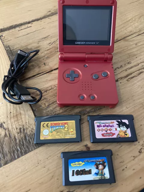 Game boy advance SP flame red Immaculate Condition with loads of games