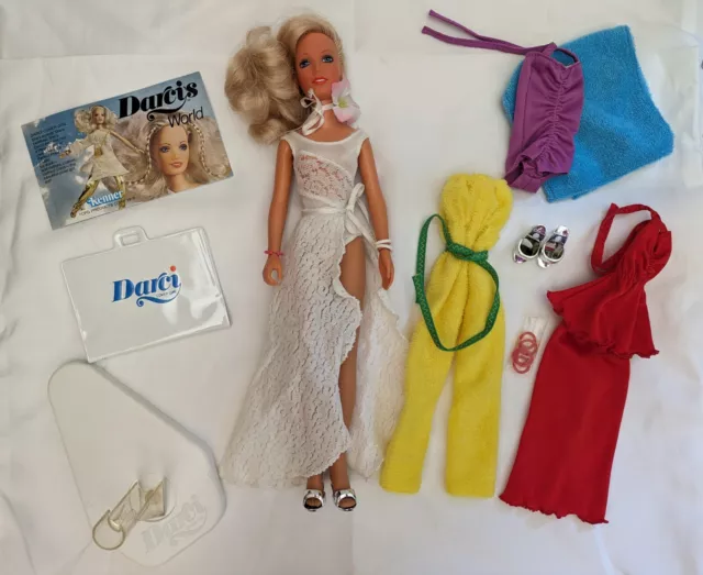 1980 Kenner Darci Doll; Firecracker, Mellow Yellow, and Simply Splashing Outfits