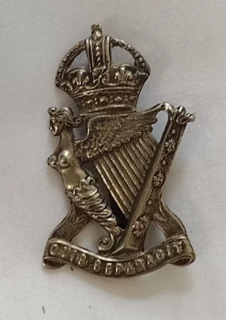 The Royal Irish Regiment Cap Badge KC Slider White Metal ANTIQUE Org