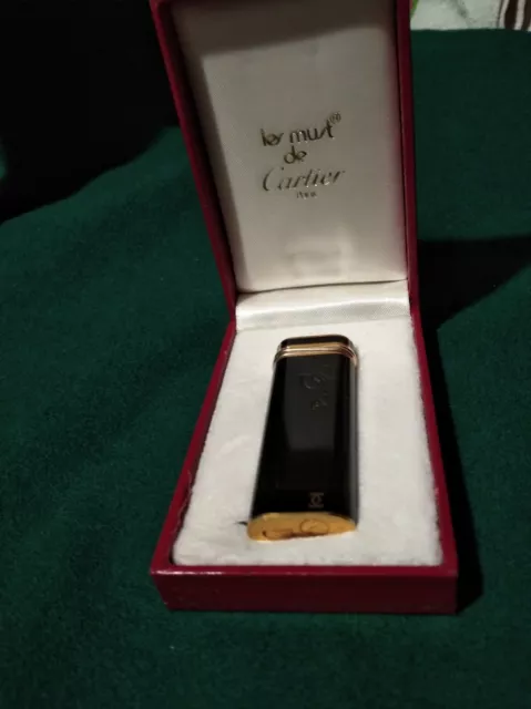 Cartier🌺Lighter🌺AccendinoTrinity band gold oro🌺Laccato nero🌺con  Box. Leggi