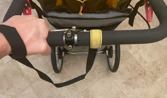 Correa de seguridad para muñeca de mano - negra y amarilla para cochecito BOB Revolution fabricante de equipos originales