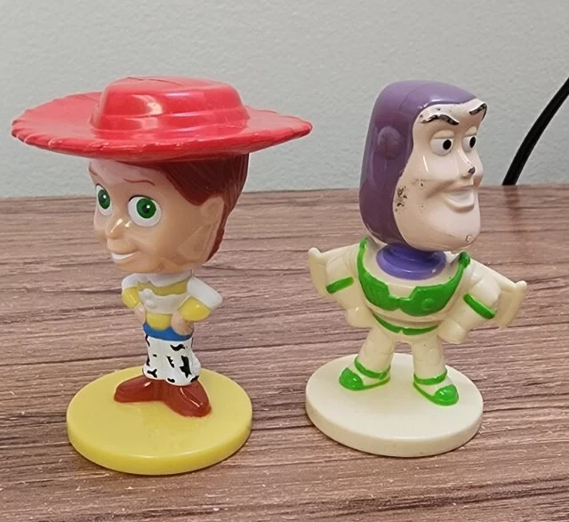 LOT OF 2 DISNEY Pixar Bobble Head Figurines KELLOGGs TOY STORY Jessie