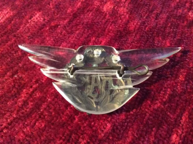 WW11 R.A.F.cap badge mounted on aircraft canopy acrylic wings. 2