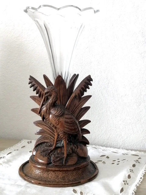 Unique : Antique crystal vase on a gorgeous handcarved wooden sculpture
