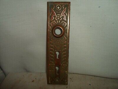 stamped Eastlake/ Victorian brass door knob backplate  # 51