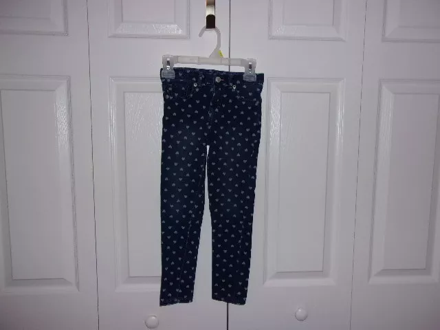 Girls super  skinny jeans by Levi in sz 6 jeans are dark blue with light hearts.