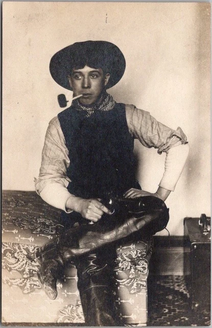 1910s RPPC Real Photo Postcard Young Man in Cowboy Outfit / Smoking Pipe -Unused