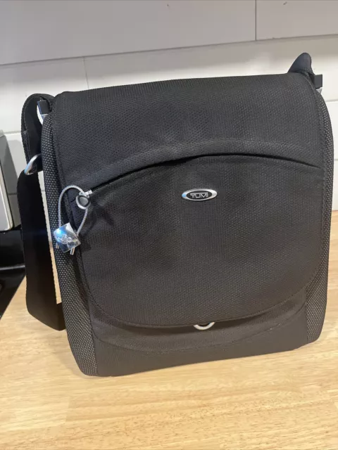 Tumi crossbody Messenger bag or Picnic bag.