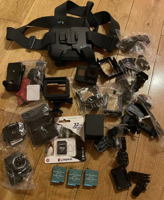 GoPro Hero 7 Black with Sports Accessories + Hard Case + 32GB Memory card