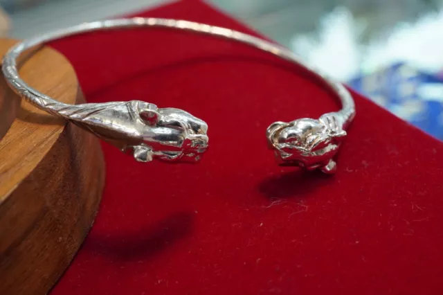 925 Sterling Silver Bangle with Panthers Head on the terminals. Adjustable