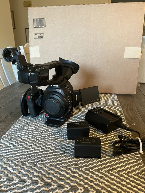 Canon EOS C100 Mark II Cinema Camera Body + 2x Batteries & Charger + Microphone Canon EOS C100 Mark II Cinema Camera Body + 2x Batteries & Charger + Microphone