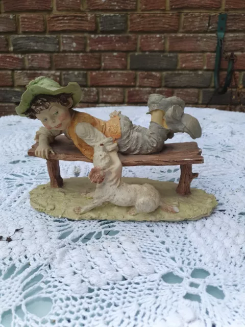 Vintage Giuseppe armani gullivers world figurine boy on bench with dog - Signed