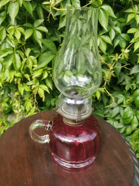 Antique Cranberry Victorian glass finger lamp with falks burner No Faults