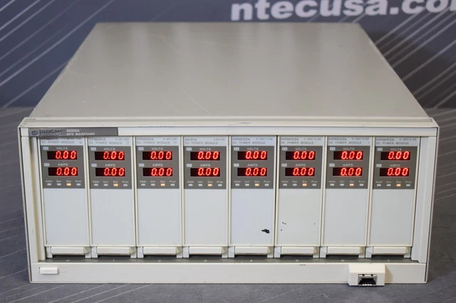 HP 66000A Mainframe w/ Qty. 4 66101A Qty. 1 66102A Qty. 66103A DC Power Modules