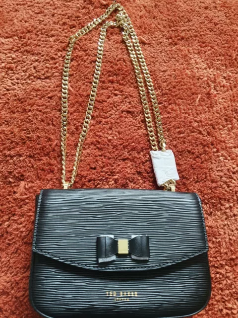 TED BAKER BLACK cross body bag. Gold chain. Bow detail. BNWT
