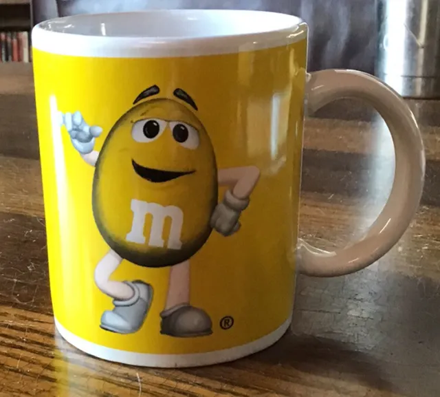 M&M Coffee Mug Cup Yellow By Cyrk Inc. Vintage Collectible Cup.