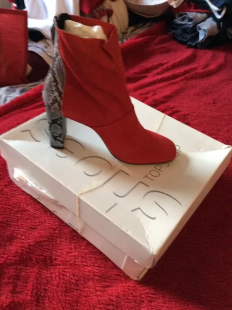 Bottes top rouges daim