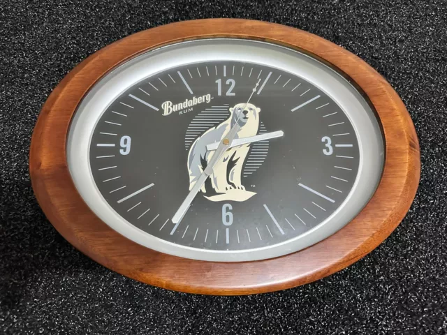 Bundaberg Rum  wooden oval clock 40x30cm mancave bar  next day postage . VGC