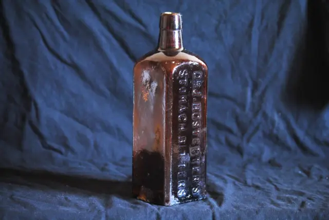 vintage antique brown glass square bottle dr j hostetters stomach bitters w/chip