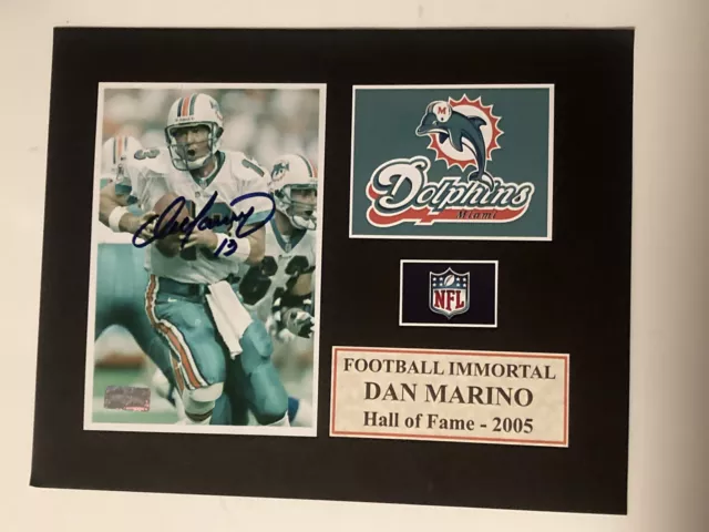 Dan Marino signed Autographed 5x7 Photo In a 8x10 Matt “ Dolphins” with COA. HOF