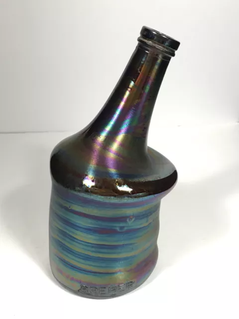 https://www.picclickimg.com/6nwAAOSwguFizPky/Carnival-Glass-Bottle-iridescent-Dreher-empty-rare.webp