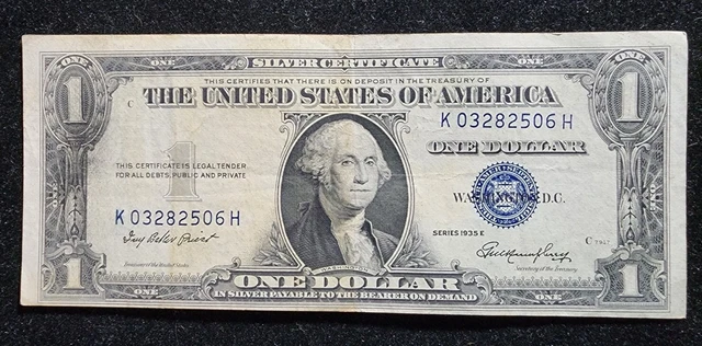 Blue silver certificate one dollar bill 1935 E. Fr 1614.  Our T2902