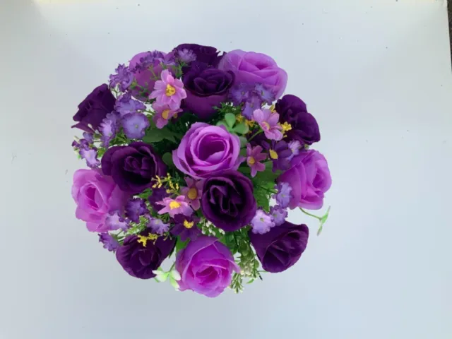 Beautiful artificial Purple flower arrangement in grave/memorial/crem pot