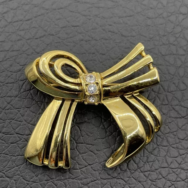 Vintage Bow Tie Brooch Pin Gold Tone Clear Rhinestones Open Work 3D Figural