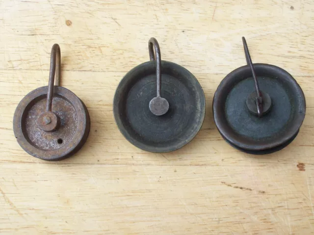 THREE 19th CENTURY LONGCASE CLOCK PULLEY WHEELS