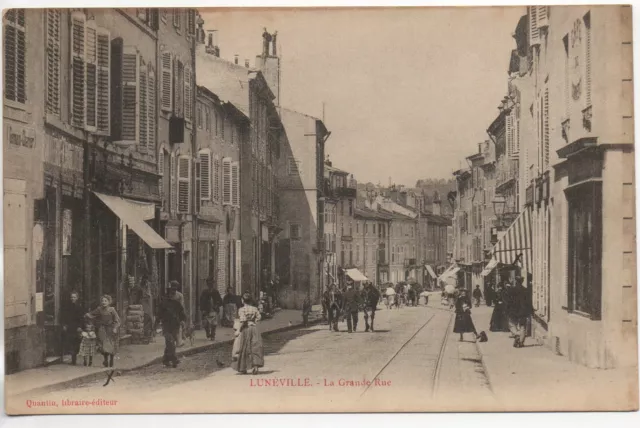 LUNEVILLE - Meurthe et Moselle - CPA 54 - des magasins dans la grande rue