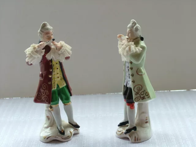 Pair of miniature porcelain figures. Continental makers marks. 3