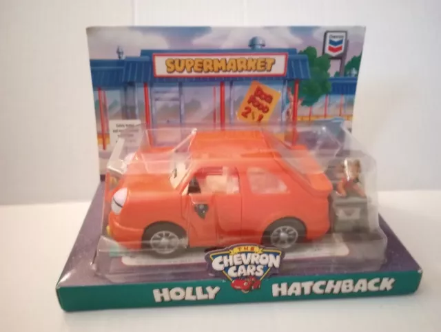 Orange Holly Hatchback & Dog Vintage 1997 The Chevron Cars Collectible Toy
