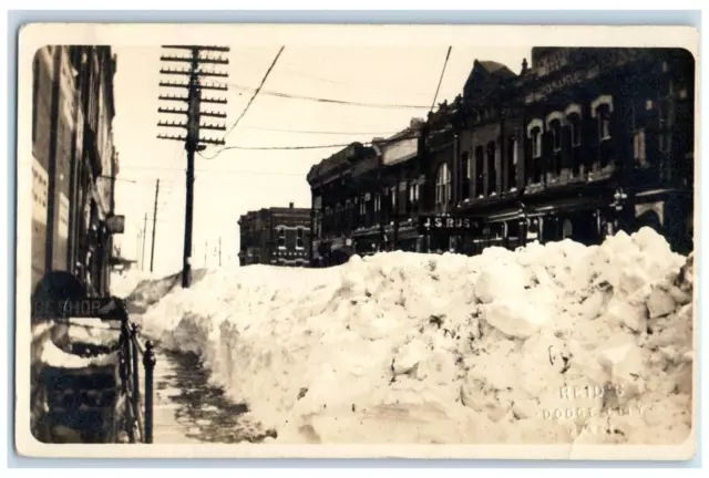 Dodge City Kansas KS RPPC Photo Postcard Reid's Snowstorm Buildings Scene c1910s